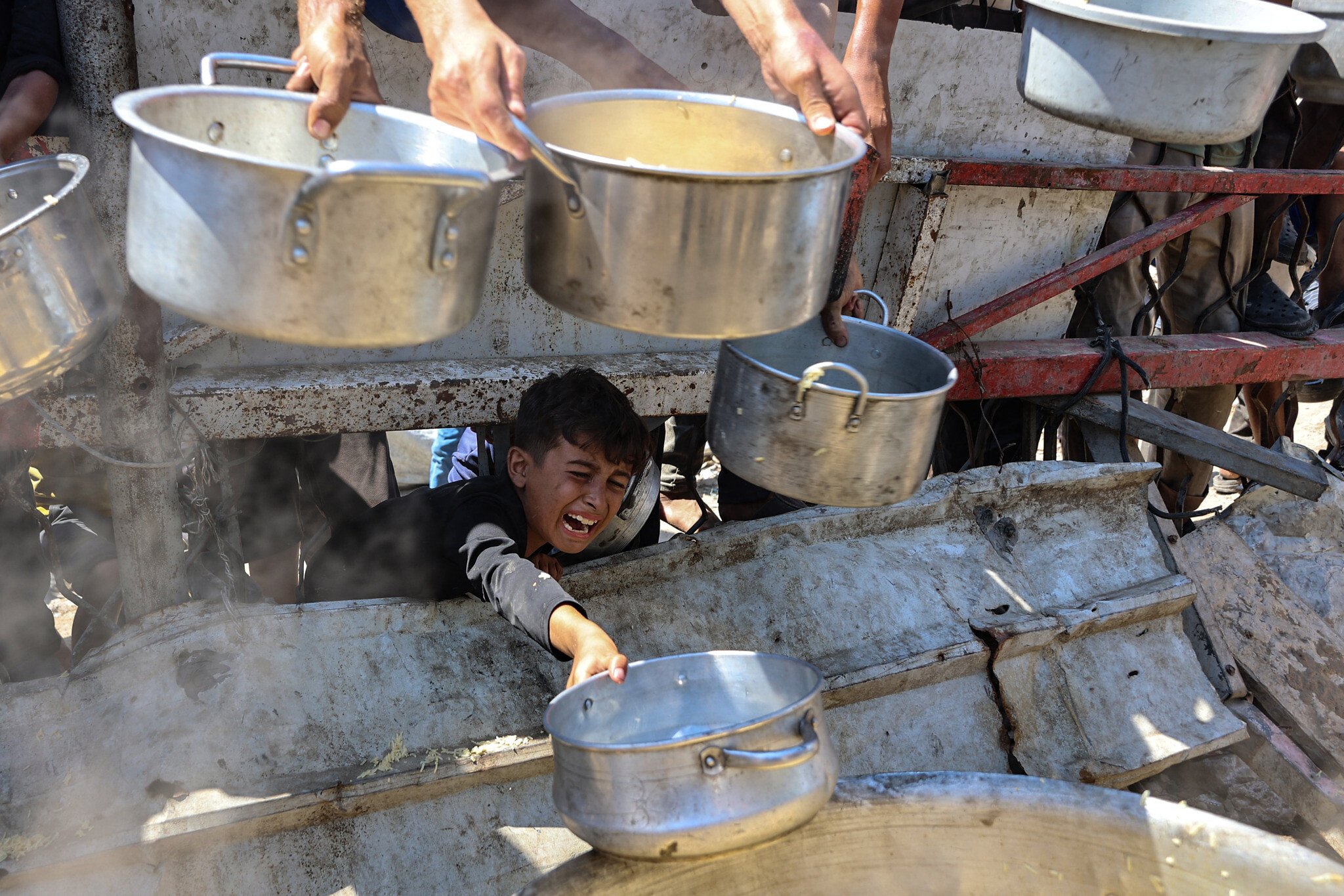 Preventing Food from Entering Gaza, Killing its guards, and Obstructing its Presence is a Full-Fledged War Crime